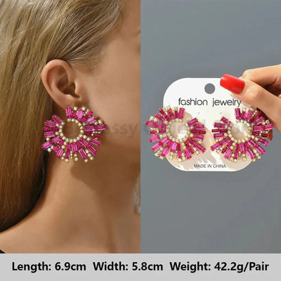 Valentines Kristall Baumeln Ohrringe in Pink und Gold mit rundem Design